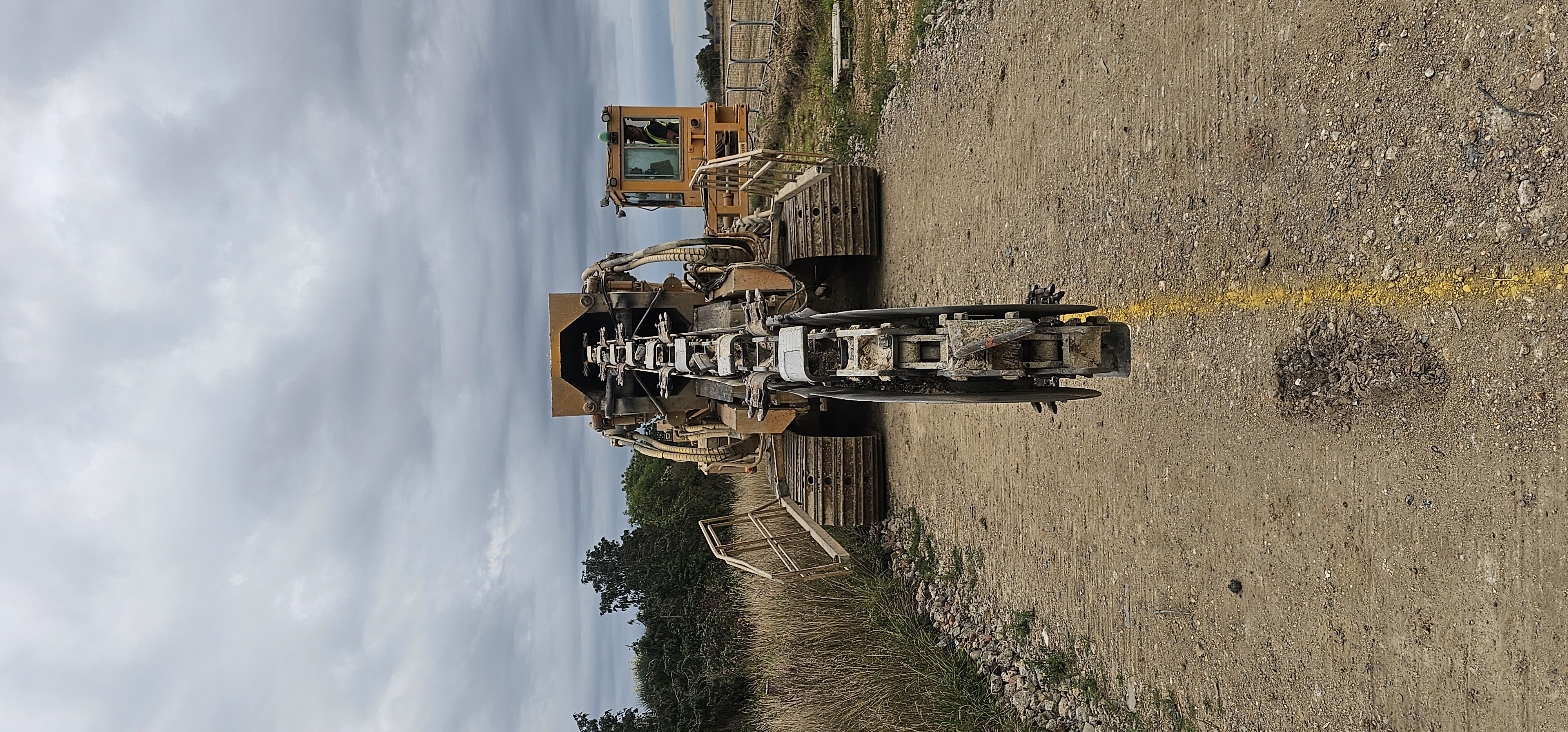 Modified trencher shoe during cutting operations
