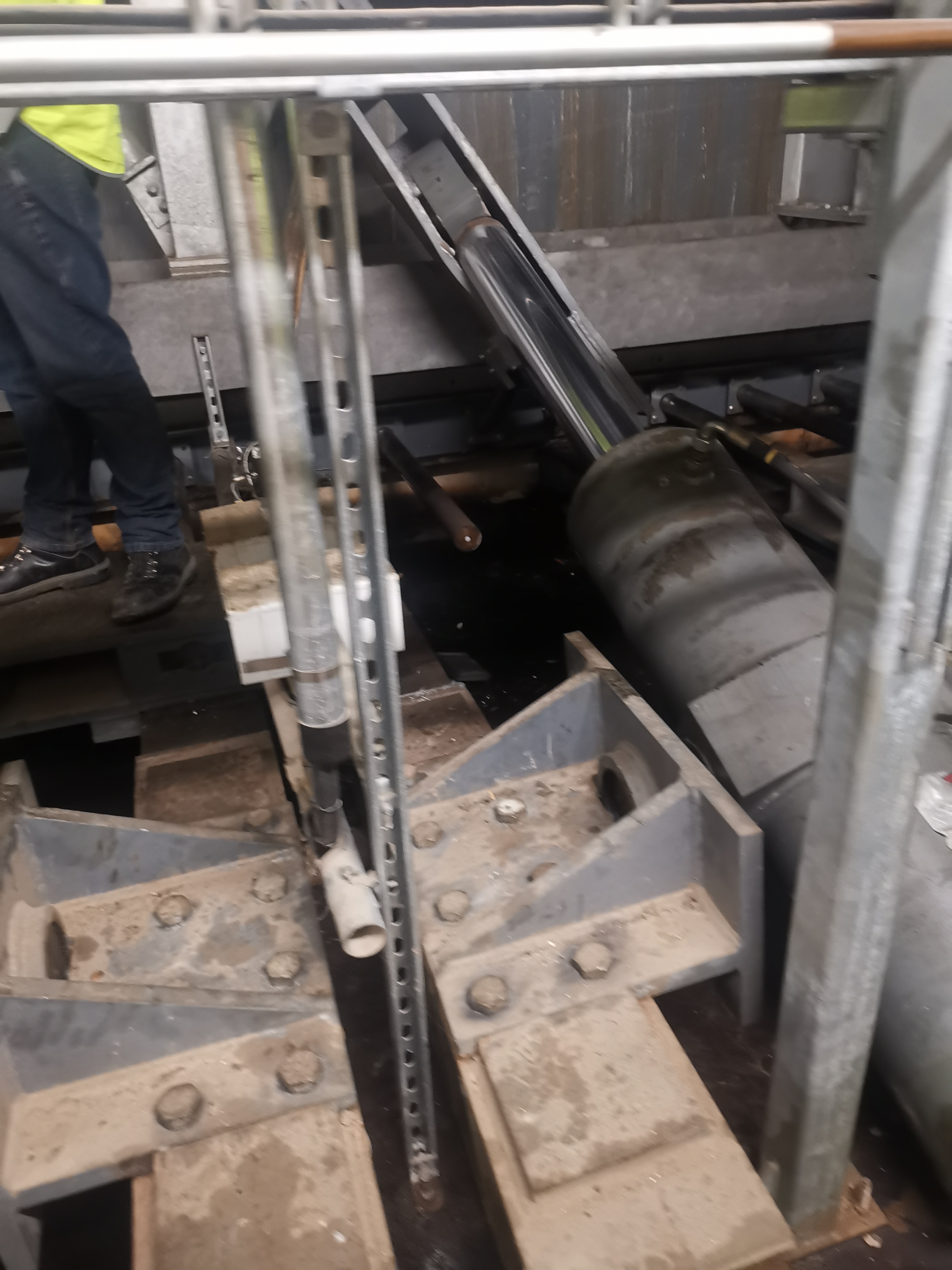 Galvanised inspection platform installed beside the conveyors