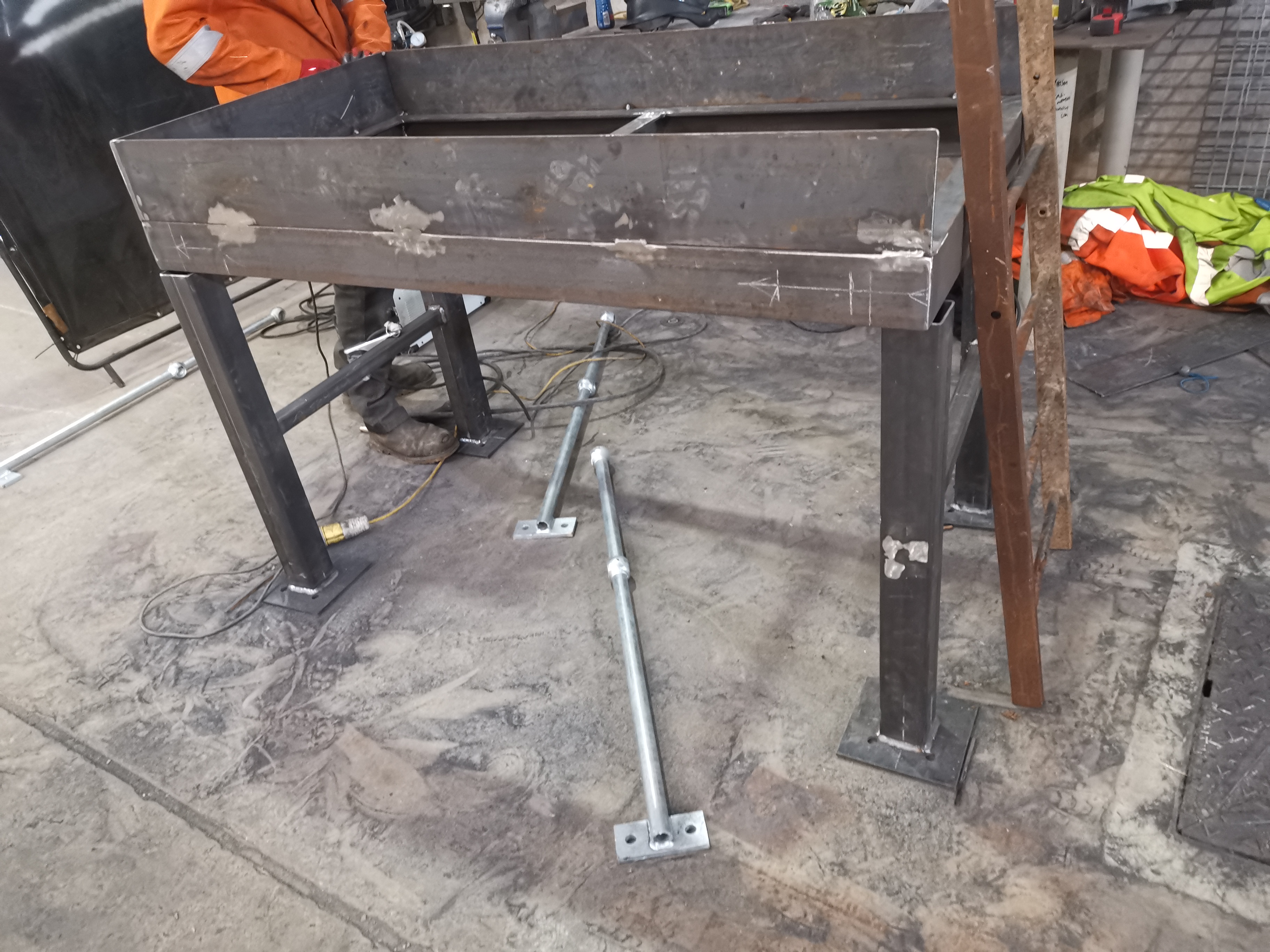 Walkway and service access through the waste handling area