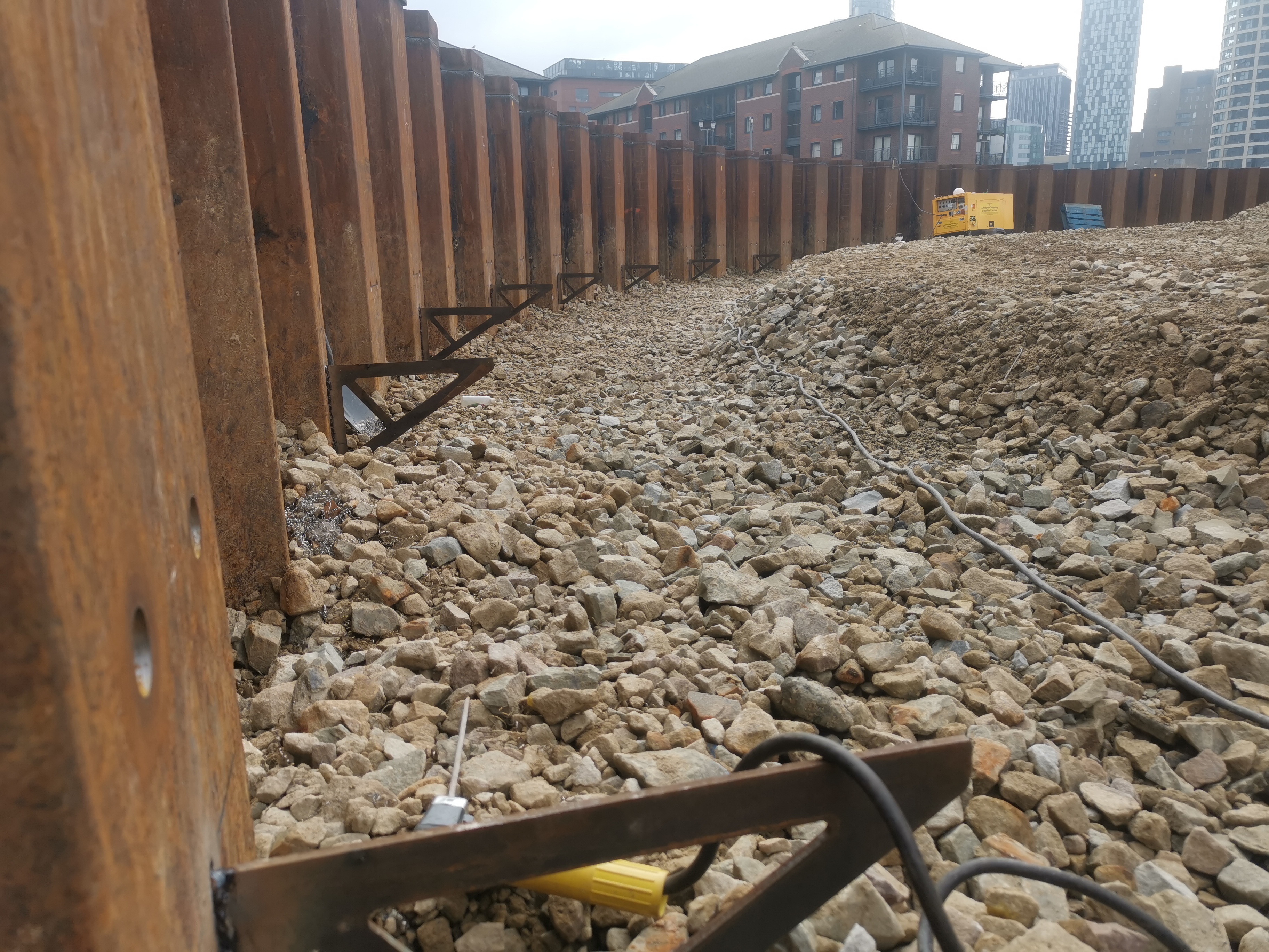 Beam brackets welded to the outpans waiting for beams