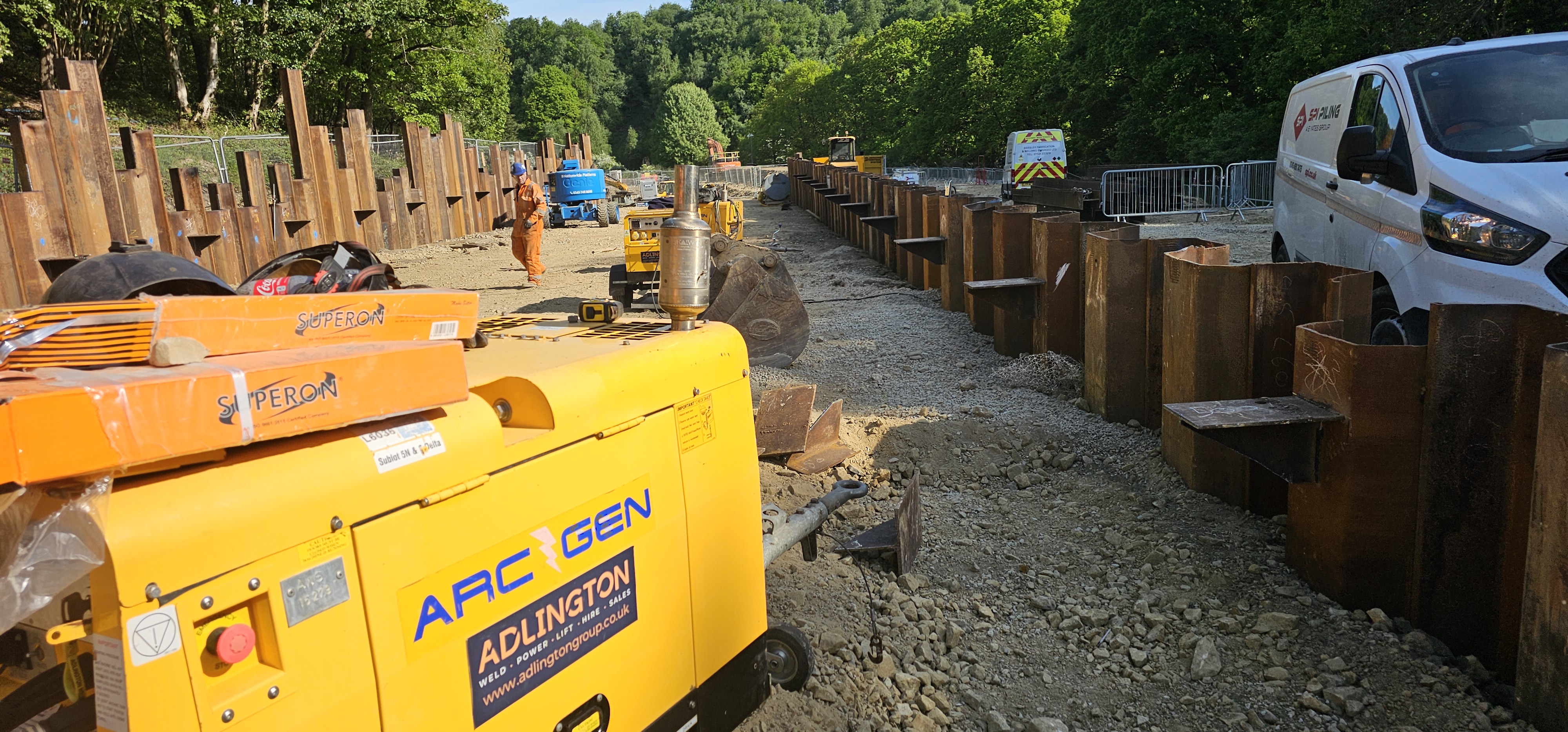 Sheet pile line with welded waling brackets ready for the cofferdam