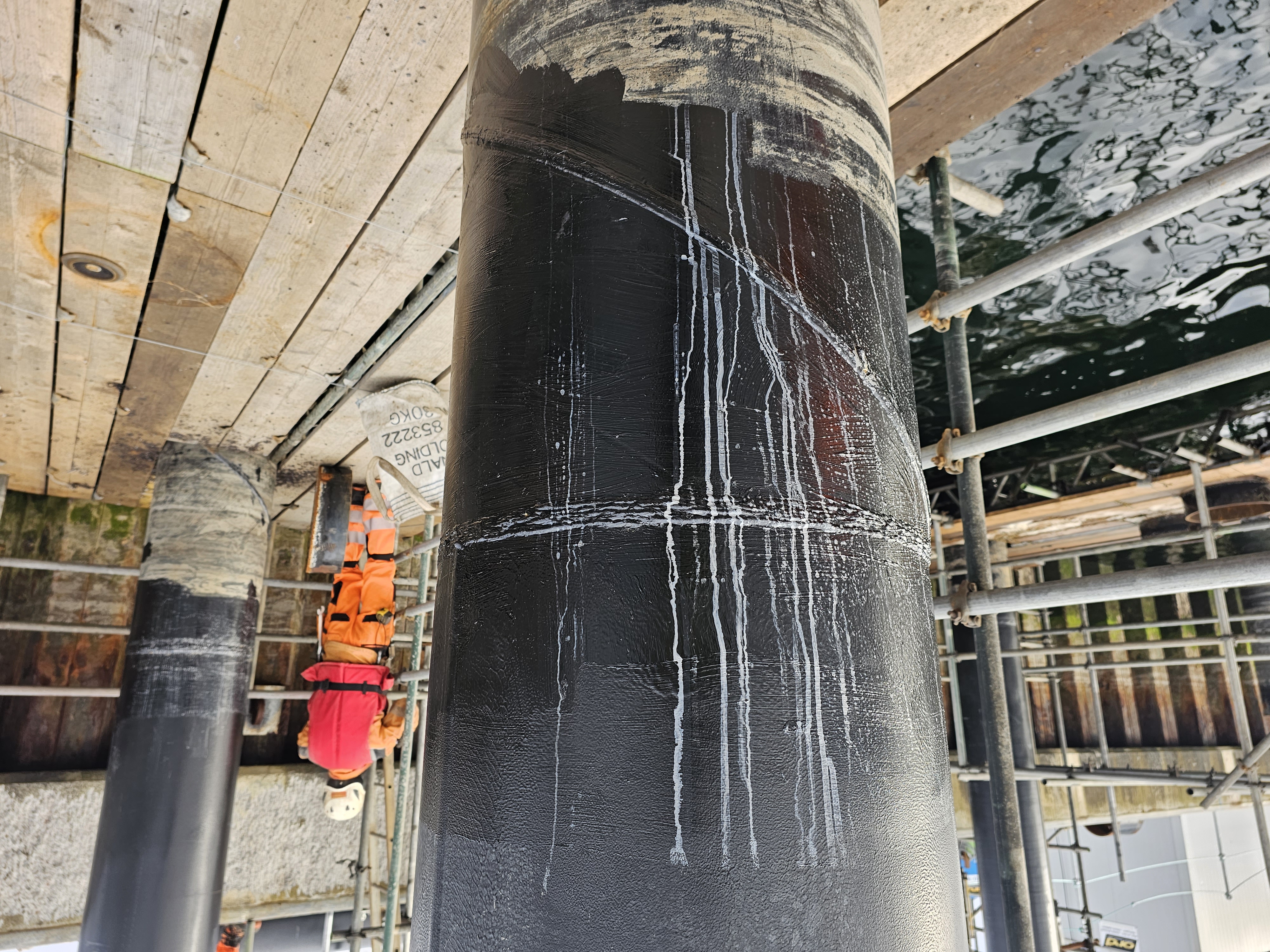 Repainted extension tubes with marine topcoat