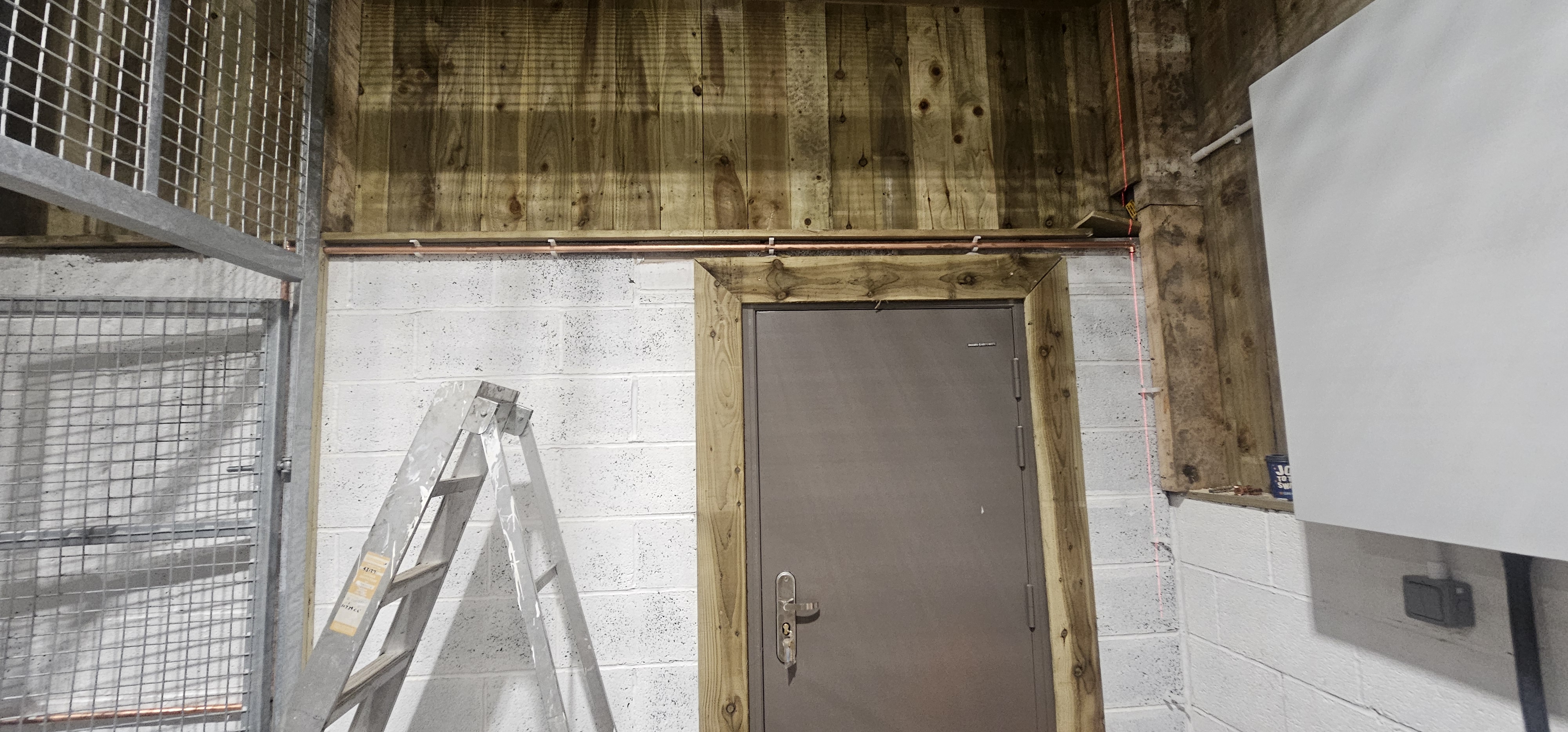 Steel frame detail with braces and roof beams in place
