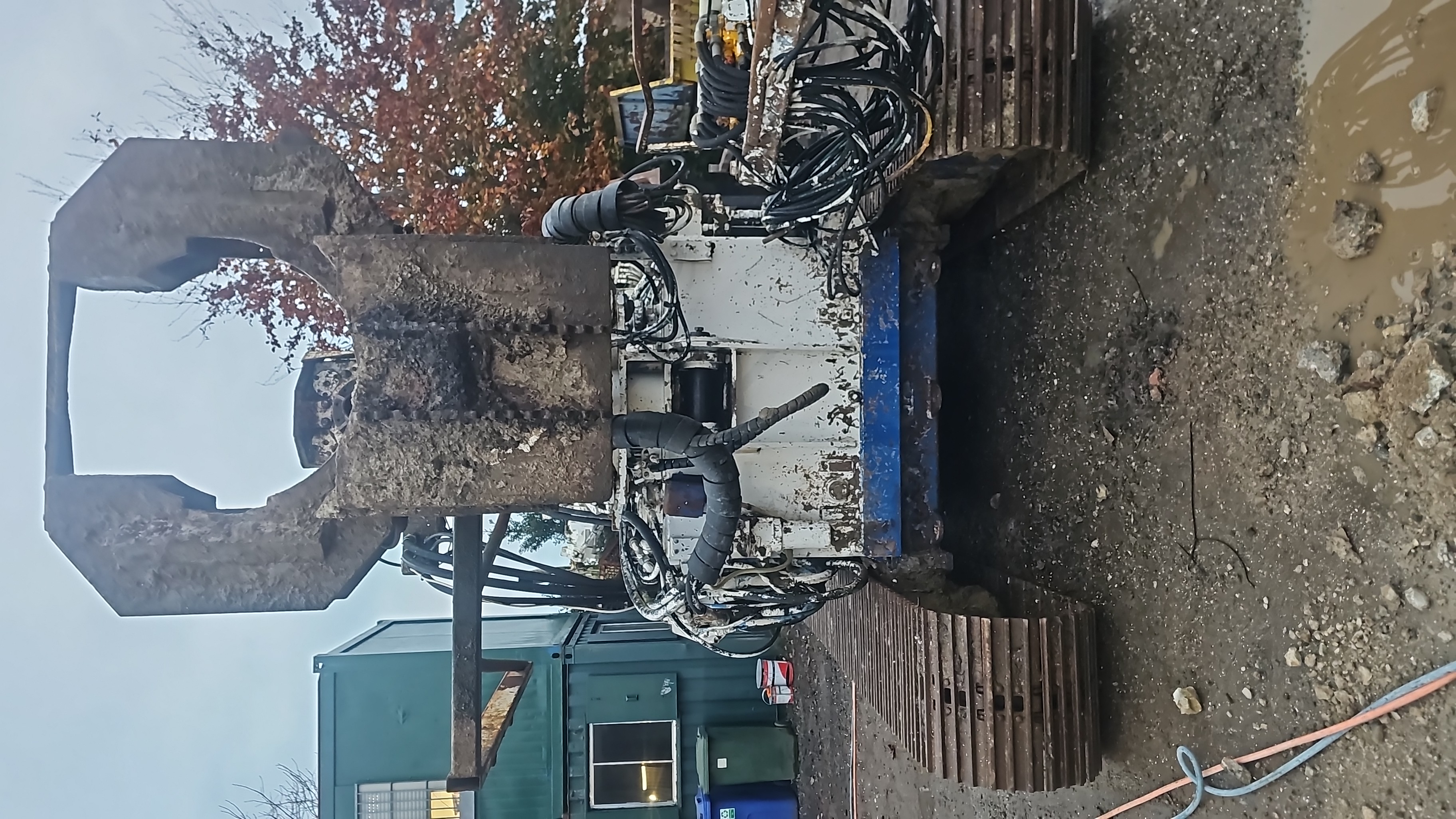 Original canopy sections showing severe corrosion and missing guarding