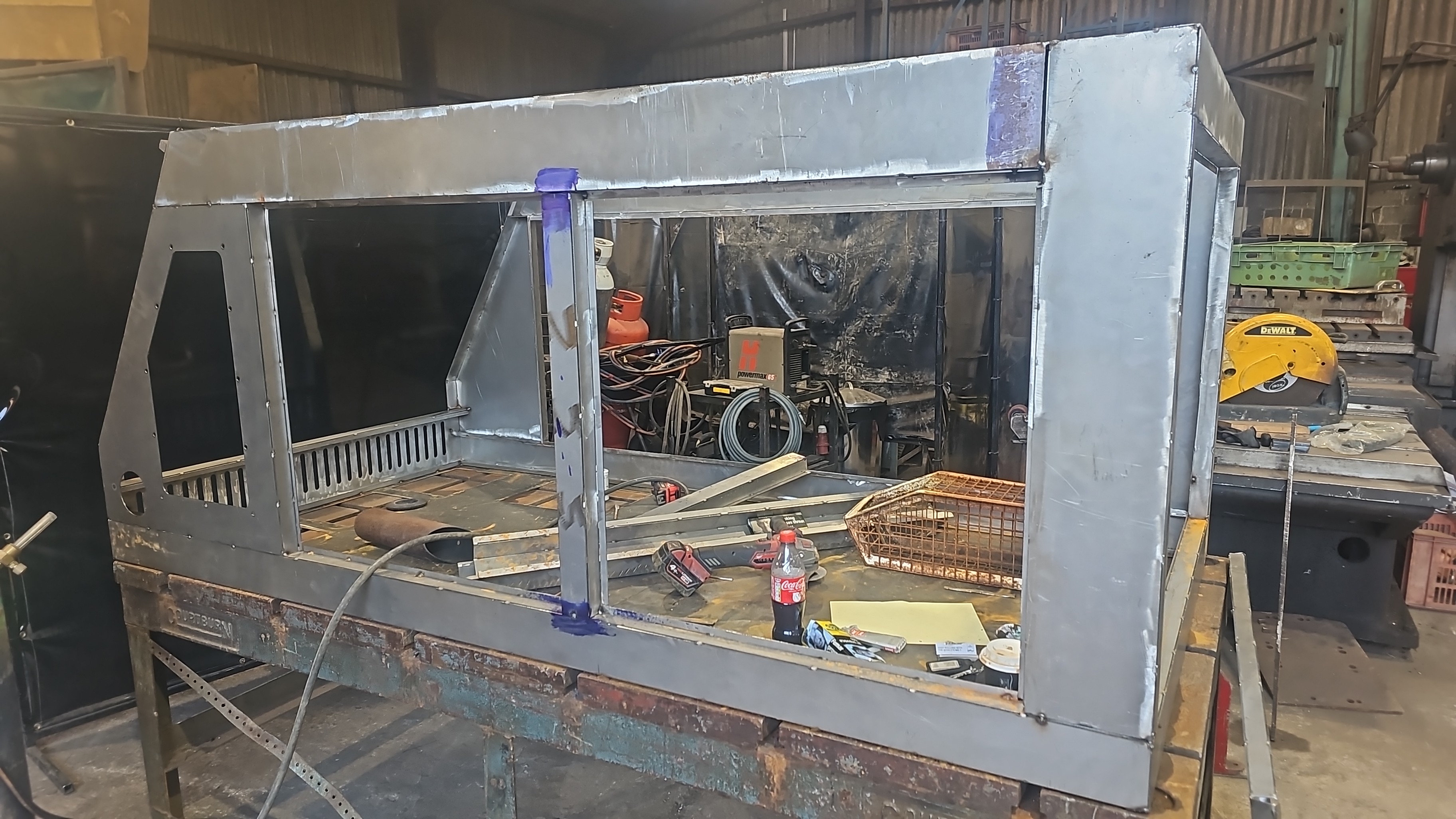 Final inspection on the rebuilt canopy before the rig left the workshop